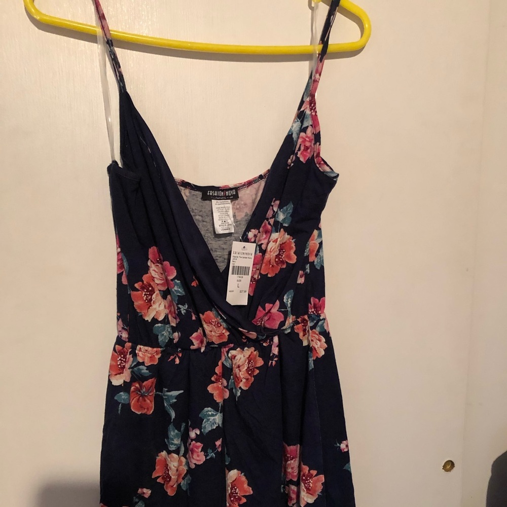 Fashion Nova romper blue w/flowers, size large